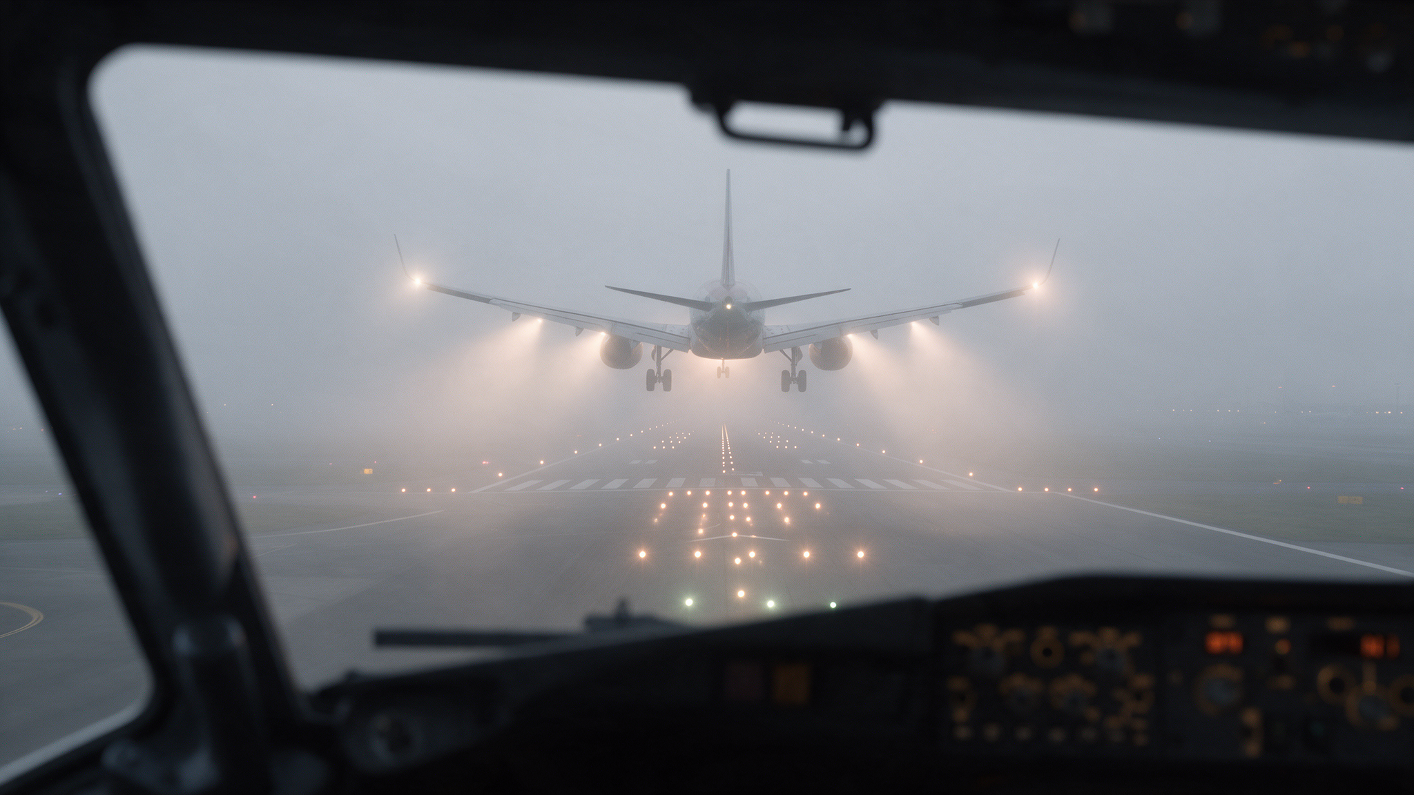 Pilot flying an instrument approach in dense fog